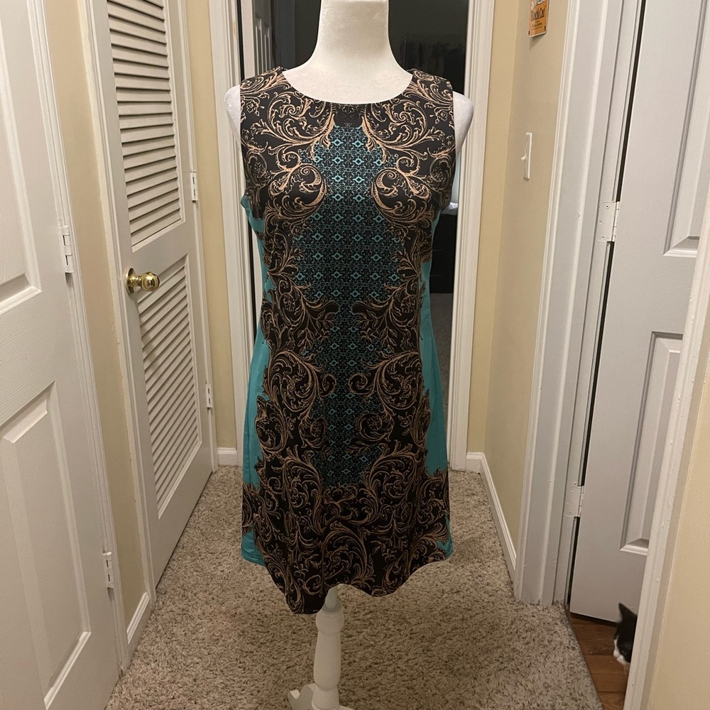 Aryeh classy sleeveless dress.  Beautiful Gold and turquoise color. Size S